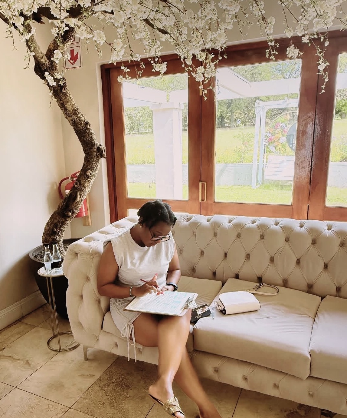 Dinkeng M. writing during a reflective moment